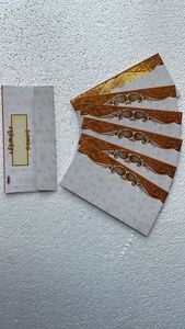 Enveloppes à fenêtre en kraft faites sur mesure, empilées soigneusement, offrant une promesse silencieuse, cadeaux, économies, intentions réfléchies, chaque pli - Product Image 3