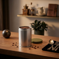 Recipiente cilíndrico para café, hermético, de aluminio plateado, para granos de café, apto para alimentos, certificado LFGB, para almacenamiento en mostradores de cafeterías, restaurantes y cocinas.