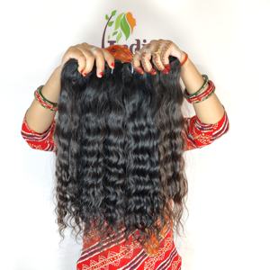 Vente en gros Extensions de cheveux humains vierges bouclés vietnamiens à double tirage Faisceaux noirs Cuticule alignée Cheveux indiens bon marché pour femmes - Product Image 1