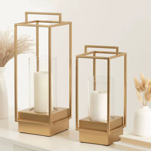 Linterna moderna de acero inoxidable pulido, perfecta para una elegante decoración de jardín y patio al aire libre con iluminación de ambiente cálido - Product Image 1