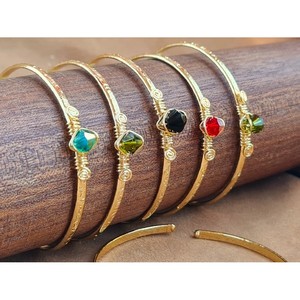 Stylish Hammered Design <b>Fashion</b> <b>Bangle</b> with Colorful Gemstone Detail for Resale Appeal - Product Image 1