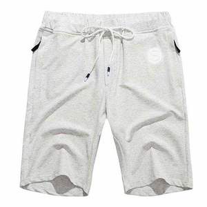 Pantalones cortos deportivos personalizables de talla grande para hombre de poliéster 100%, estilo callejero, malla holgada, patrón sólido, respetuoso con el medio ambiente - Product Image 2