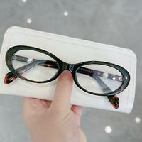 Lunettes de vue vintage ovales en acétate avec branches en métal incrustées de perles, monture optique tendance pour femme