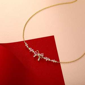 Collar Jeulia de Plata de Ley Chapado en Oro con Corazón y Lazo con Circonita - Product Image 4