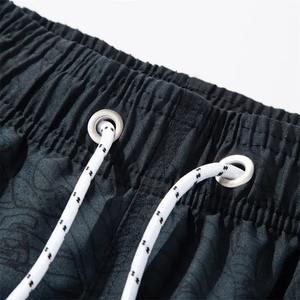 Short de sport décontracté pour hommes, ample et respirant, vente en gros, extensible sur les quatre côtés, pantalon de surf de plage à séchage rapide, motif solide de poches moyennes - Product Image 5