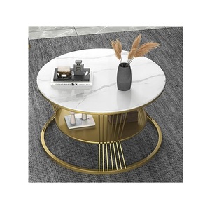Mesa de centro de estilo premium de diseño de tendencia, tapa de mármol blanco con soporte dorado brillante utilizado en el Salón del hotel en casa a precio de venta - Product Image 1