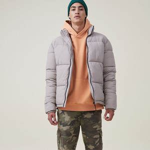 Nuevo precio de fábrica Abrigo de invierno para hombres Chaqueta acolchada transpirable con tela genuina OEM Ropa informal Chaqueta acolchada de punto de talla grande - Product Image 4