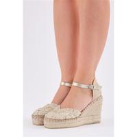 Espadrille fermée à talon compensé haut