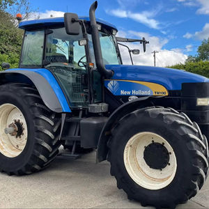 Tractor Usado 4x4 New Holland con Certificación EPA y Cargador Frontal en Buen Estado, Oferta Especial, 100 Caballos de Fuerza, en Venta - Product Image 1