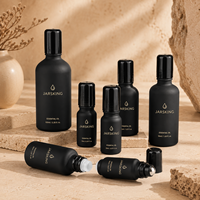 Flacon roll-on en verre fin noir mat anti-reflet pour sérums contour des yeux haute performance et extraits végétaux