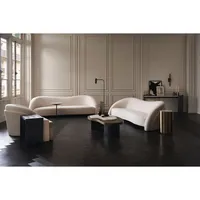 Table basse Caracole Modern Principles contrastée avec matériaux mixtes