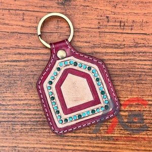 2024 meilleure vente Design main usiné en cuir porte-clés en cuir de vachette porte-clés Western élégant porte-clés fleur impression porte-clés - Product Image 1