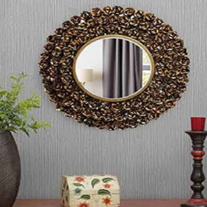 Este encantador espejo ovalado está envuelto en un marco de madera exquisitamente tallado, mostrando intrincados patrones de hojas. - Product Image 5