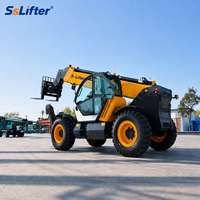 Chariot télescopique robuste avec fourche à palettes et attache rapide pour travaux de chargement en agriculture et construction