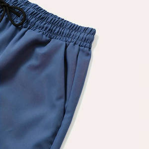 ชุดออกกำลังกายฤดูร้อนแบบ 2 ชิ้น ดีไซน์ใหม่ คุณภาพสูง ระบายอากาศได้ดี กางเกงจ็อกเกอร์พร้อมโลโก้สั่งทำพิเศษ ชุดกางเกงขาสั้นวิ่งสำหรับผู้ชาย - Product Image 6