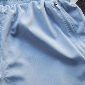กางเกงขาสั้นผู้ชายผ้าฝ้าย 100% แบบเรียบง่าย ระบายอากาศ แห้งเร็ว เหมาะสำหรับออกกำลังกาย ดีไซน์ยืดหยุ่น คล่องตัว - Product Image 2