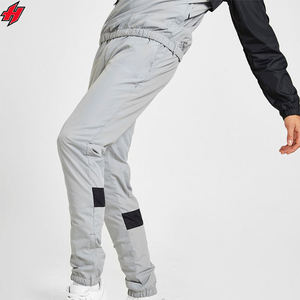 Usine en gros coupe-vent survêtements 100% Nylon personnalisé logo impression léger séchage rapide vêtements de sport survêtements - Product Image 4