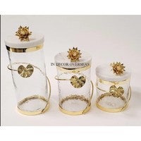Ensemble de 4 boîtes en verre clair à texture martelée attrayante, base en métal poli brillant argenté et design papillon plaqué or