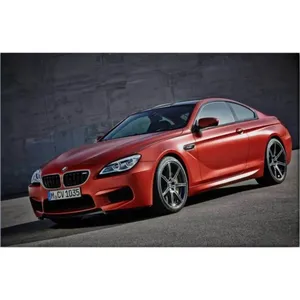 Impression sur toile de la BMW M6 rouge Fida devant un mur en béton - Product Image 6