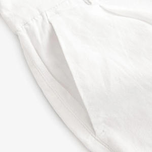 Venta al por mayor de pantalones cortos de mezclilla personalizados Irregular Slim Fit envuelto cadera pantalones cortos de mezclilla de las mujeres de moda Casual botón pantalones cortos para las mujeres conjunto de calle - Product Image 5