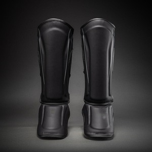 Protège-tibias en cuir noir pour la boxe, le kickboxing et le Muay Thai – Équipement de protection pour l'entraînement - Product Image 5