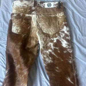 Pantalones de piel de vaca auténtica personalizados de alta calidad para hombre, ropa informal de Color sólido más vendida, pantalones de piel de vaca para hombre - Product Image 6