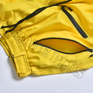 Pantalon de neige imperméable jaune unisexe avec plusieurs poches zippées fermeture à cordon et poignets élastiques pour les sports d'hiver - Product Image 4