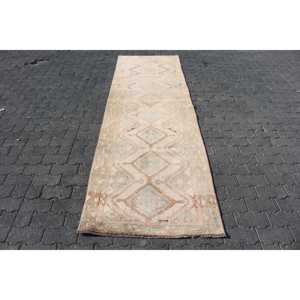 Alfombra Turca de 3x9.7 pies, Alfombra de Lana Ikat Marrón Vintage - Product Image 1