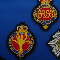 C'est un insigne brodé représentant l'emblème des Gardes du Froid, l'un des régiments les plus anciens de l'armée britannique.