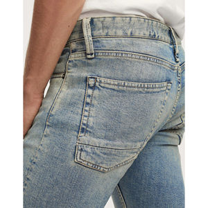 Vêtements de luxe à la mode en vente en gros Jean pantalon en jean pour hommes coupe régulière taille plus avec cordon de serrage denim écologique bleu clair formel - Product Image 4