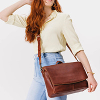 Sac pour ordinateur portable unisexe en cuir véritable, souple et rembourré, avec chaînes, fermeture éclair et bouton, prix direct usine, vente en gros