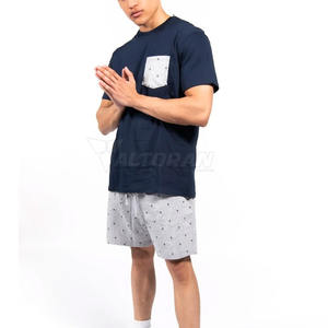 Venta al por mayor de ropa deportiva de verano para hombres, camiseta informal de manga corta y pantalones cortos transpirables con diseño de patrón sólido - Product Image 1