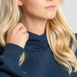 เสื้อฮู้ดกันลมทรงครอปสตรีมีโลโก้ด้านหน้า - Product Image 6