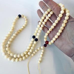 ลูกประคำอำพันขาวสำหรับสวดมนต์พุทธ ทำจากอำพันบอลติกธรรมชาติ - Product Image 2