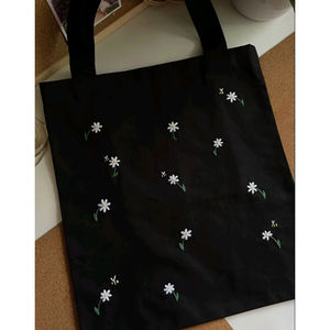 Black Daisy Scatter Canvas Tote Bag With Small <b>White</b> Floral Motifs Stylish Eco Friendly Reusable Daily Carry Shopping Bag - Product Image 1