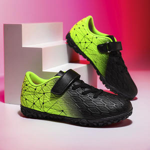 Zapatos de fútbol coloridos para niños con combinaciones de colores modernas y tacos gruesos, calzado cómodo para entrenamiento y deportes. - Product Image 1
