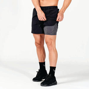 Pantalones cortos 2 en 1 de 5 pulgadas con bolsillos, tejido ligero que absorbe la humedad, color negro, 4 vías - Product Image 3