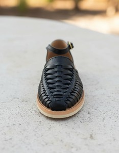 Black woven leather loafers with closed toe, buckle strap and flat sole, casual style. - Product Image 6