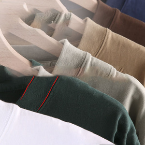 เสื้อยืดสีทึบแขนสั้นด้านหน้าผ้าคอตตอนคอมบ์หนัก320ก. ดีไซน์โลโก้ตามสั่ง OEM - Product Image 4