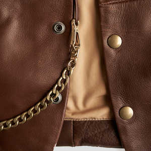 เสื้อกั๊กหนังสำหรับผู้ชายแบบปรับแต่งได้เสื้อหนังมีสไตล์สวมใส่สบายระบายอากาศได้แบบมีลวดลายบริการ OEM - Product Image 3