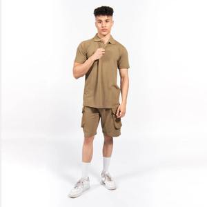 Ensemble de vêtements de sport d'été pour hommes surdimensionné pour polos et shorts à manches courtes tissu en toile motif solide - Product Image 1