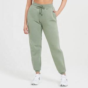 Pantalon de jogging en polaire pour femme, intérieur brossé doux, taille élastique, coupe décontractée et confortable, bas fuselé pour le loungewear - Product Image 1