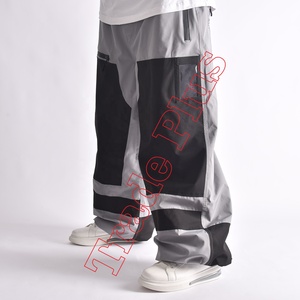 Vente en gros Pantalon cargo décontracté grande taille unisexe Pantalon en nylon respirant avec boutons et poches à rabat latérales coupe-vent - Product Image 2