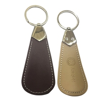 Vente en gros Porte-clés en cuir Logo personnalisé Porte-clés chausse-pied en cuir PU