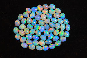 Atractiva Gema de Ópalo Etíope - Ópalos de Forma Ovalada de 9x7 mm - Cabujón de Ópalo Etíope Welo Galaxy Fire para Joyería - Product Image 2