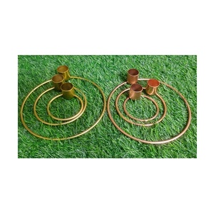 Bougeoir de forme ronde en fil de métal au design moderne Bougeoir à prix personnalisé de haute qualité fini or - Product Image 1