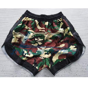 Vente en Gros de Shorts de Muay Thaï 100% Polyester Satiné Tissu Muay Thai Trunks avec Logos Personnalisés Broderie par Sublimation Fabriqué au Pakistan - Product Image 1