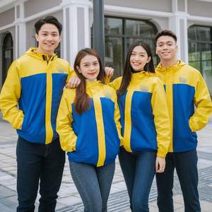 Elegantes chaquetas de uniforme cortavientos: diseño cómodo con cuello alto y bolsillos con cremallera para empleados en condiciones de invierno - Product Image 1