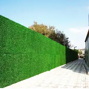 Promosi baru produsen panel pagar rumput buatan Eropa untuk dinding luar ruangan dan penggunaan privasi. Permukaan tanah yang lembut