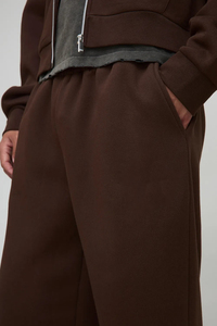 กางเกงผ้าฝ้าย100% ขายาวสำหรับผู้ชายสีทึบโอเวอร์ไซส์ใส่สบายสีพื้นซักได้ตามต้องการ - Product Image 2